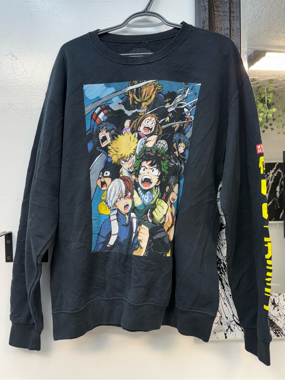 Black Crewneck Sweater with Colorful Anime Graphic